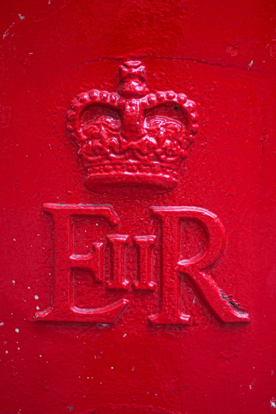 Taken in London of a mailbox. After some research, I believe this is the queen's crest. E II R stands for Elizabeth the Second Regina is latin for Queen. by Clothing Brands EIIR logo